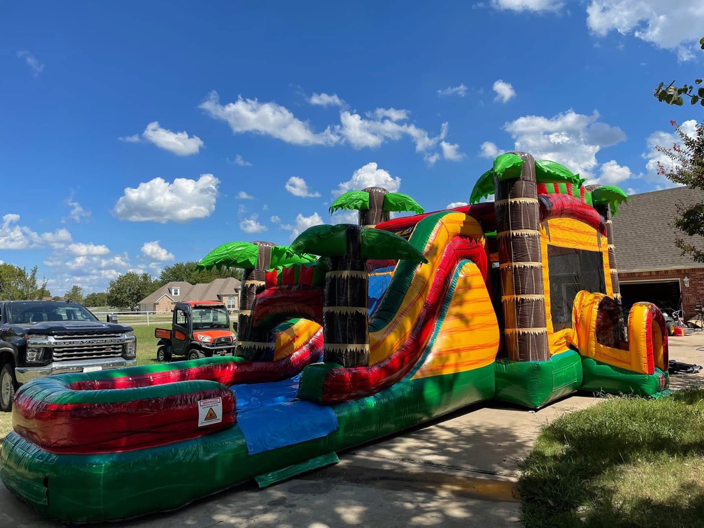 Tropical tiki bounce house combo rental