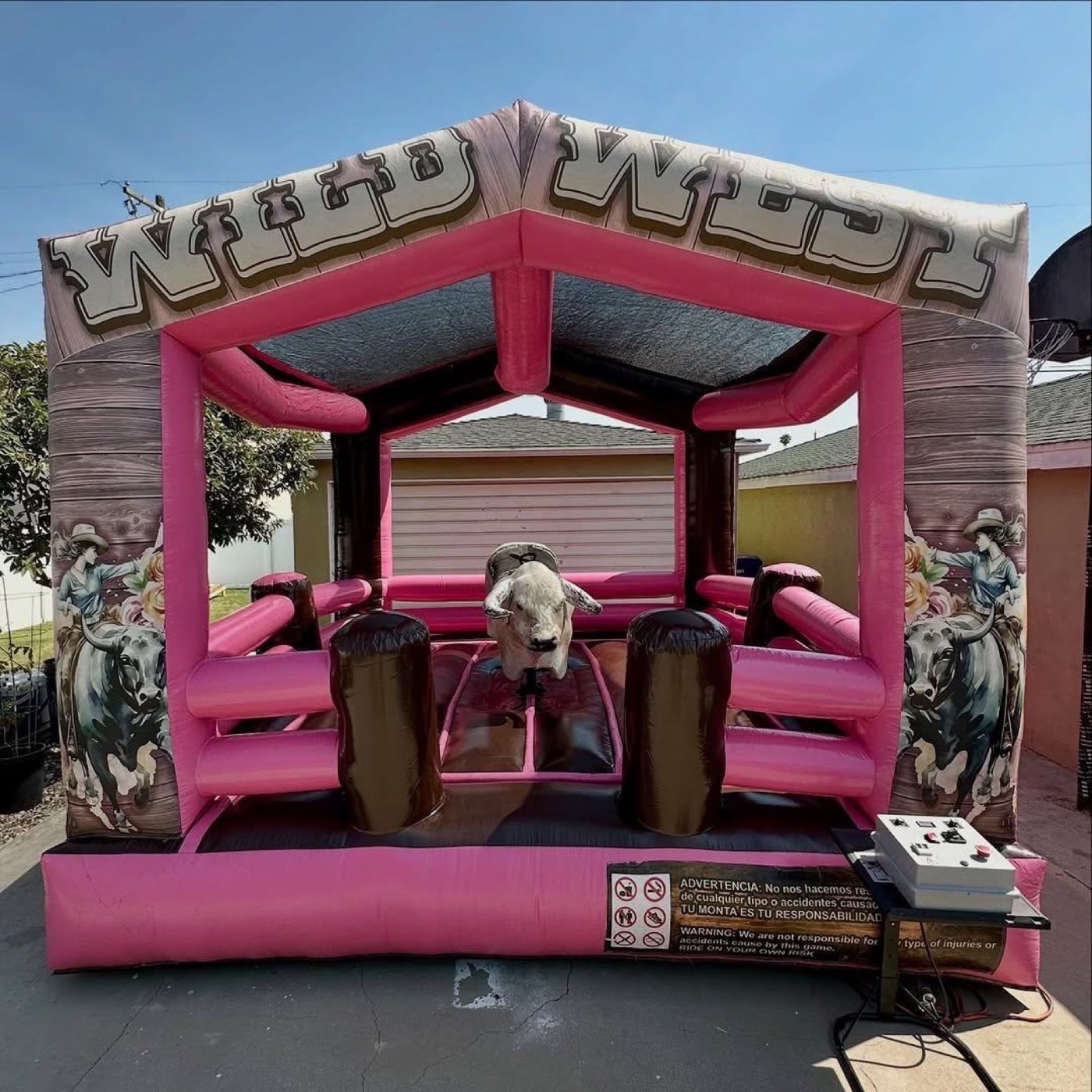 Pink covered Wild West themed mechanical bull arena