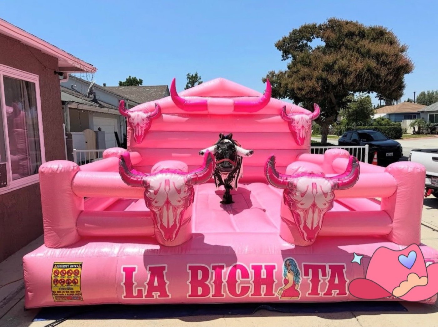 Guest riding the La Bichata mechanical bull