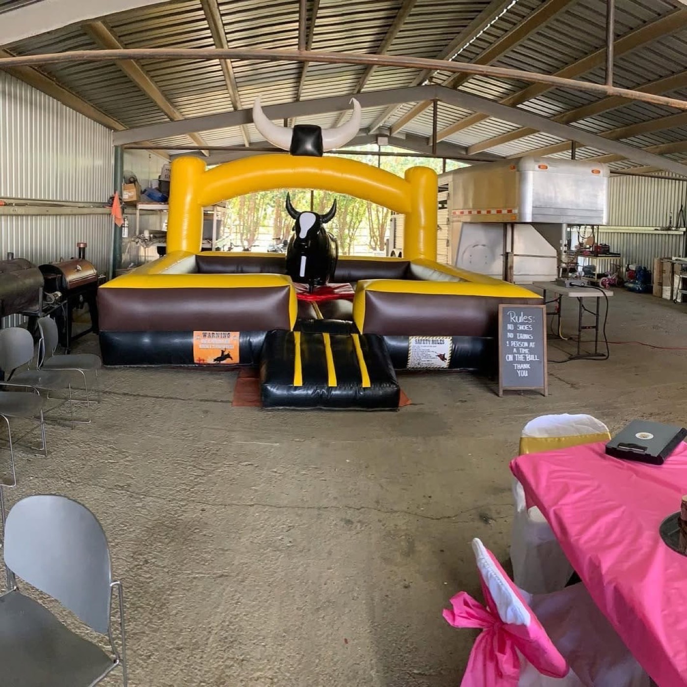 Classic yellow and black mechanical bull arena